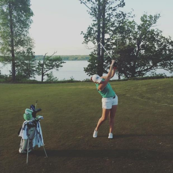 Golfer swinging